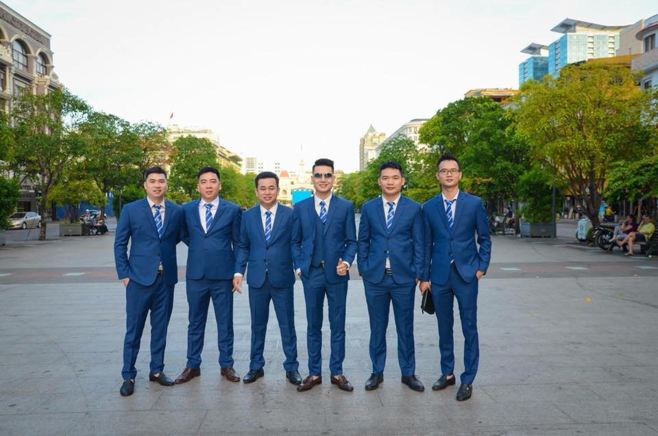 May đồng phục veston